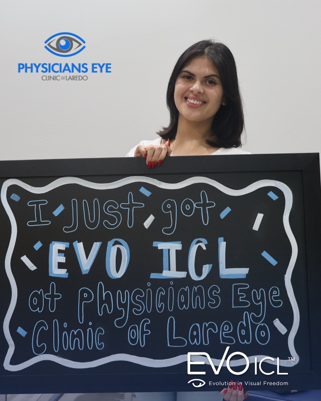 A young Laredo patient holding a chalkboard that reads 'I just got EVO ICL at Physicians Eye Clinic of Laredo'